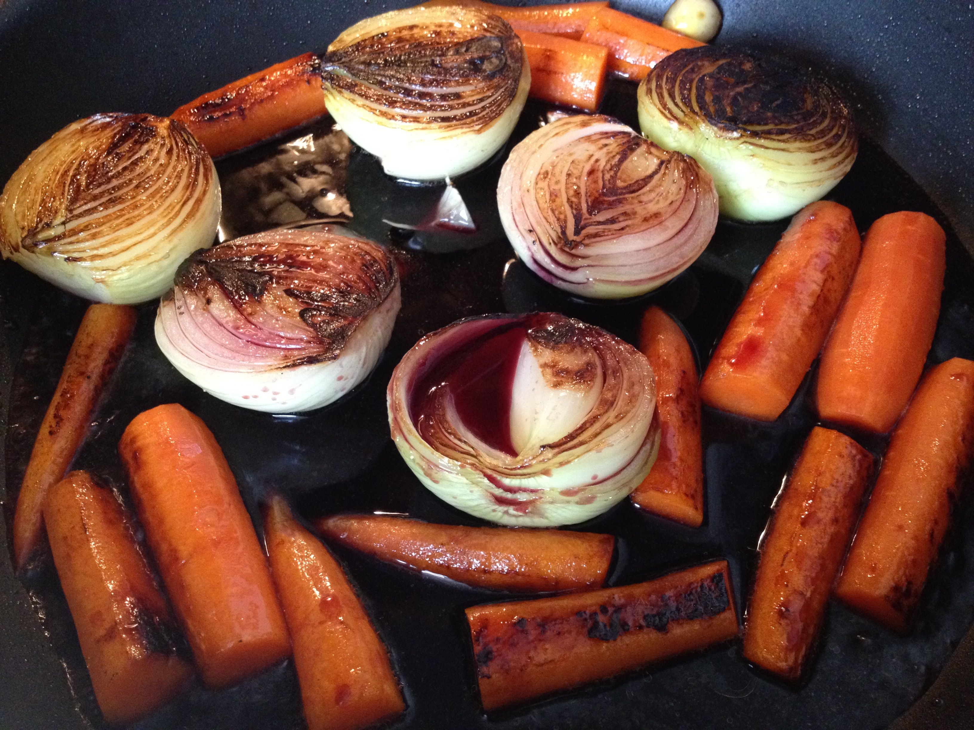 Browned carrots and onions with red wine.