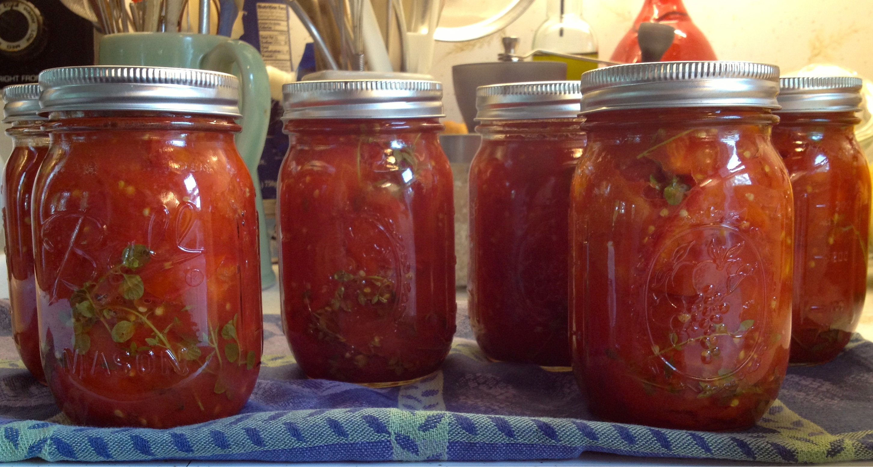 Tomato jars ready for storage.
