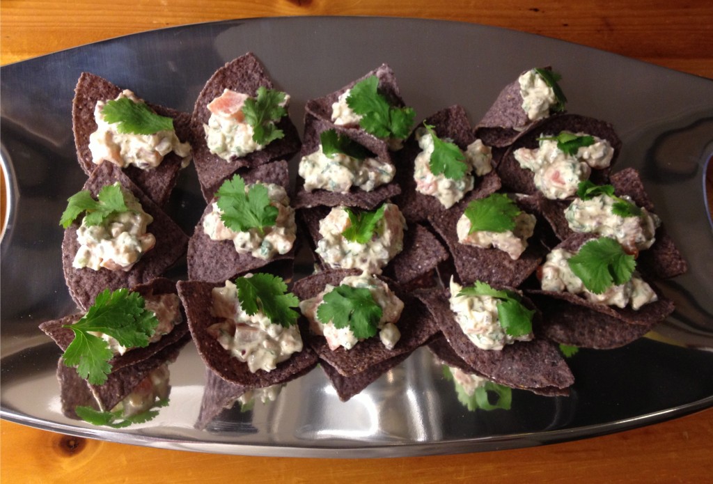 Texas smoked salmon tartare on blue corn chips as an appetizer from Food and Wine magazine.