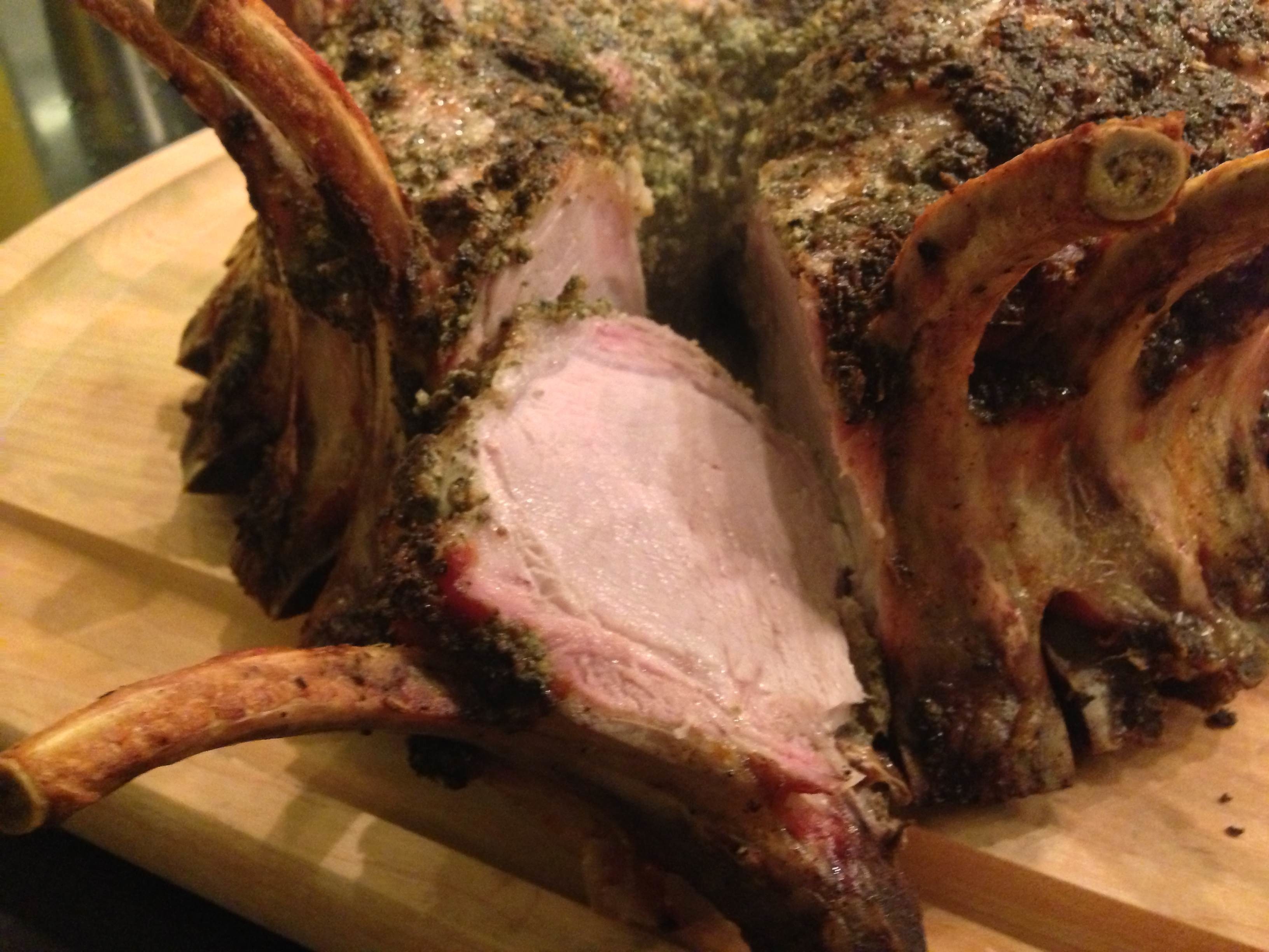 Crown roast of pork with succulent chop cut from first cut.