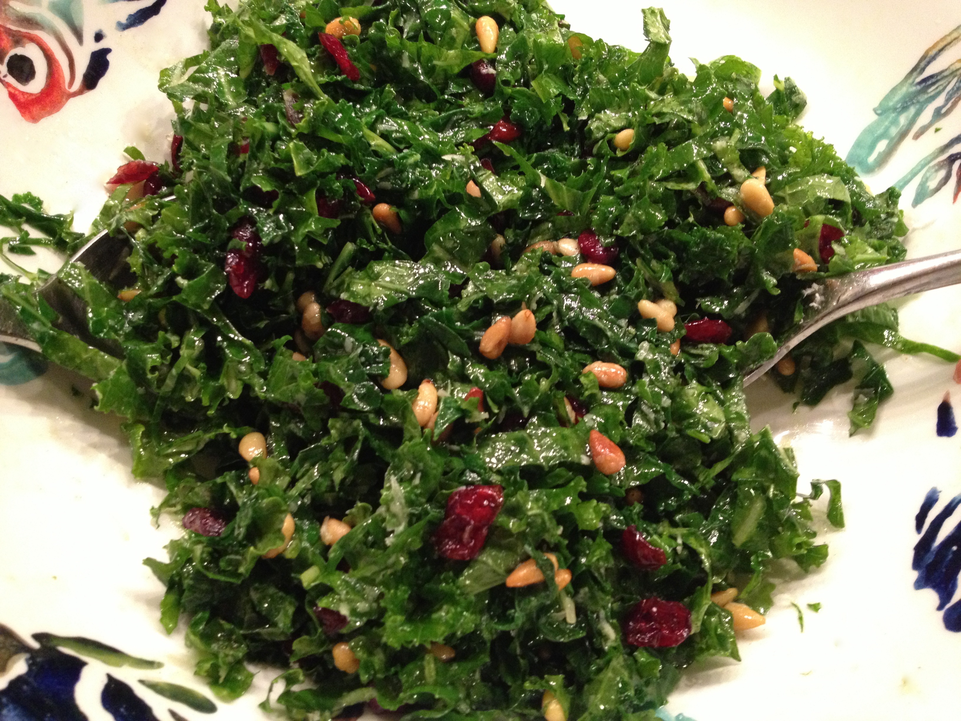 Kale salad with cranberries and pine nuts
