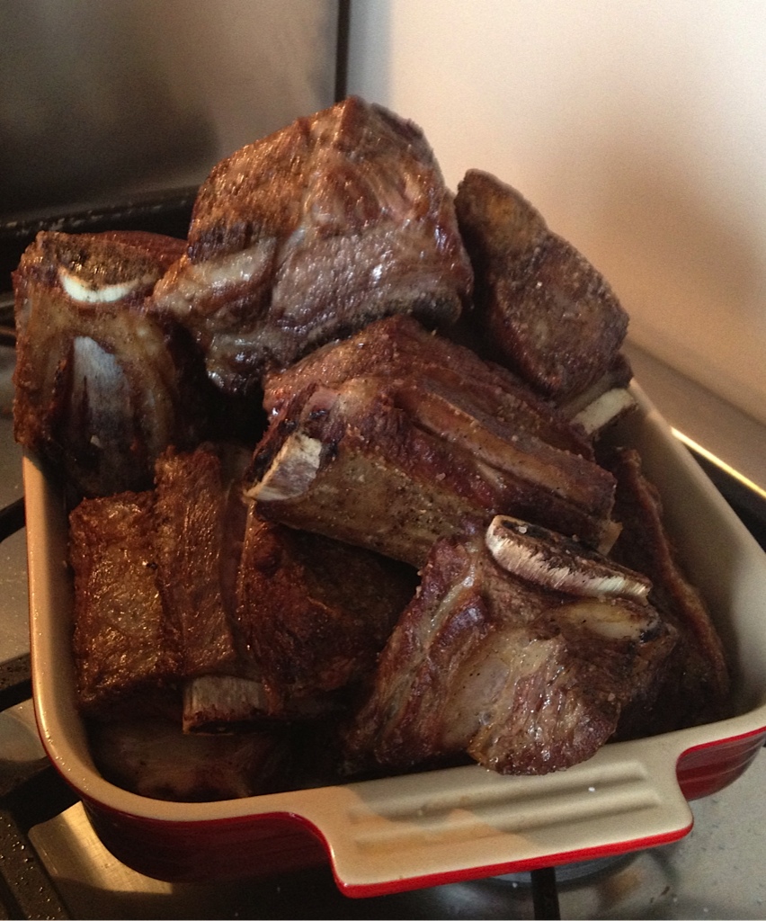 Browned short ribs in a Le Creuset dish