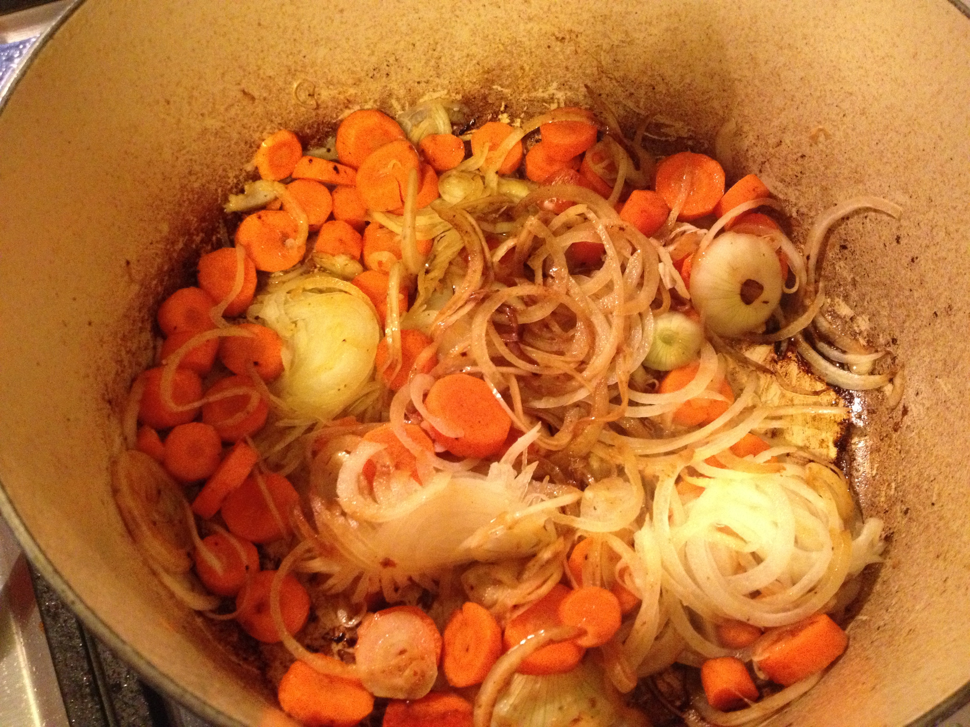 Browning carrots and onions for beef stew.
