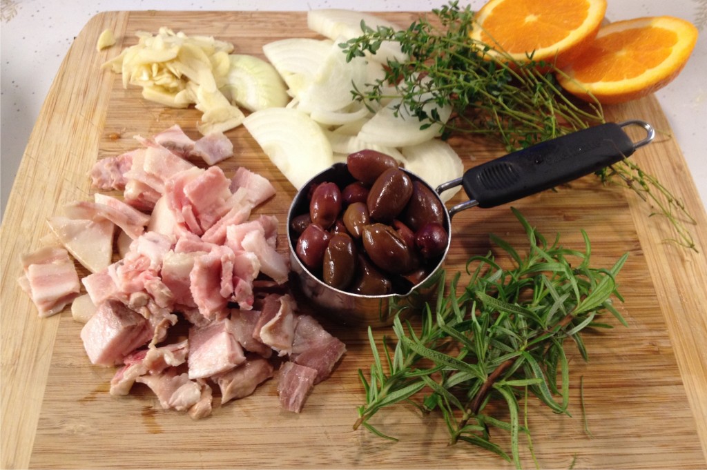 Lamb daube ingredients on a cutting board.