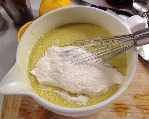 Flour mixture in olive oil cake batter.