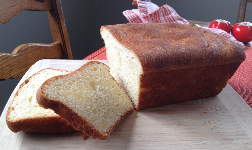 Homemade bread cut with two slices.
