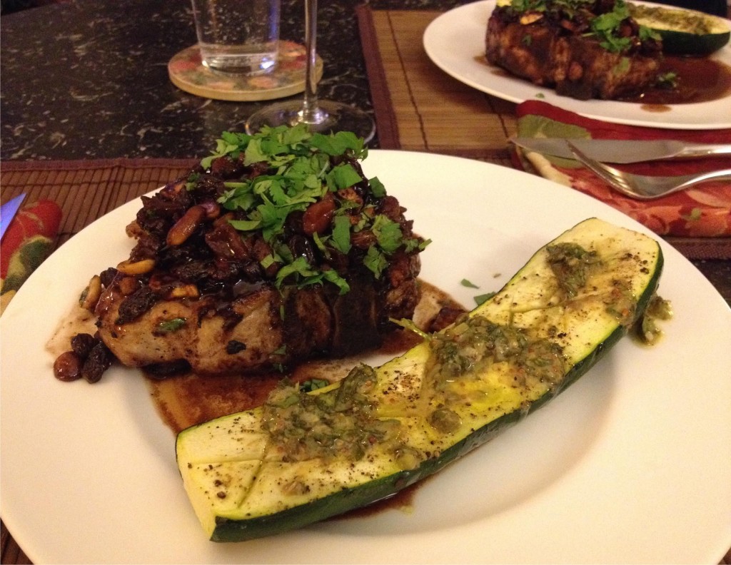 Chili Chocolate Pork Chops with Apple Aplenty on two plates on table