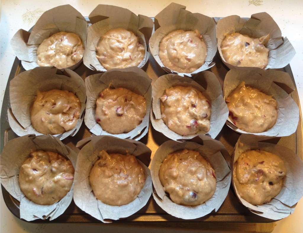 Cranberrry walnut muffins - dough in lotus paper cups.