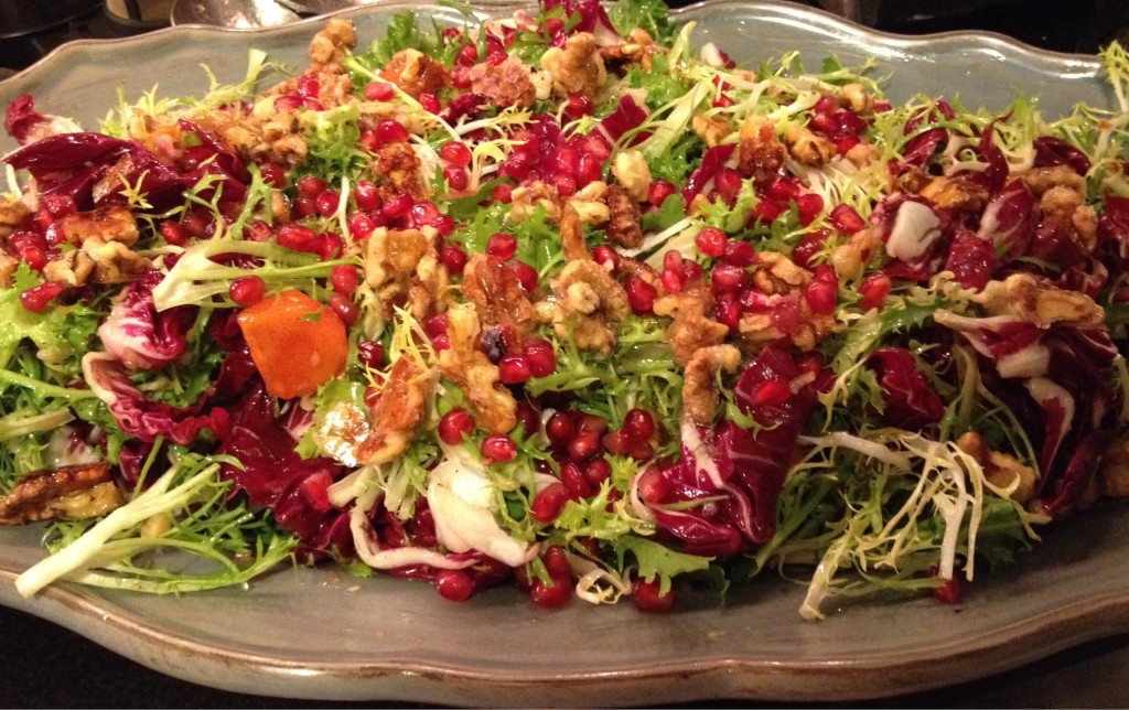 Persimmon pomegranate and frisee salad.