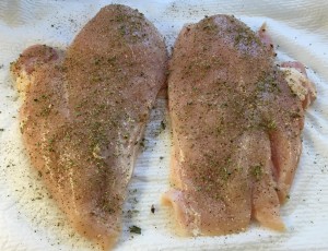 Chicken breasts seasoned with salt, pepper and oregano.