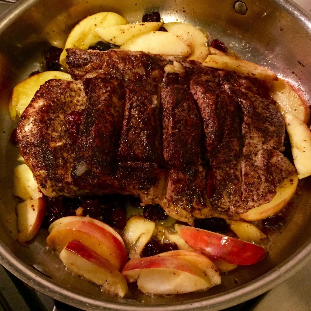 ust Cook Herbed Coffee Rub on pork cooking in skillet.