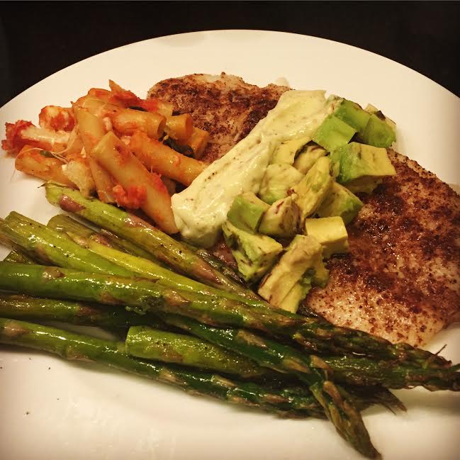 Fillet of flounder roasted with Garam Masala topped with avocado and homemade mayo with lemon roasted asparagus and baked ziti.