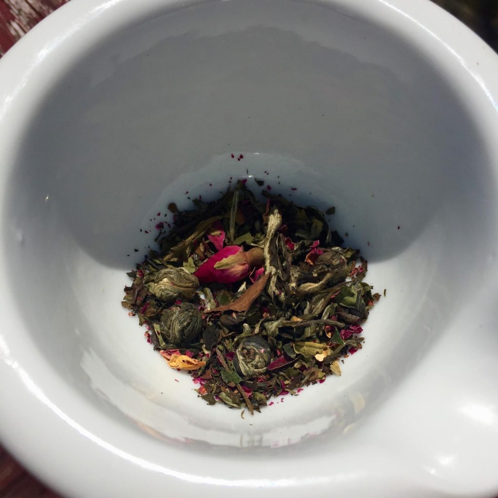 The Tea Spot Meditative MInd tea in a white porcelain mortar.