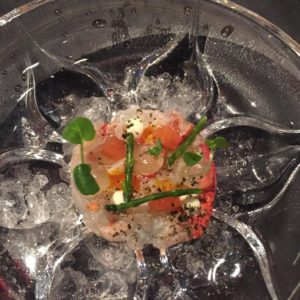 Nolita's fish course - lobster sashimi, elderflower, samphire.
