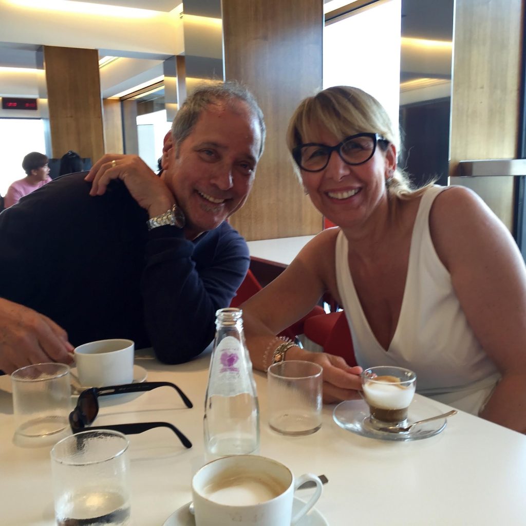 Steve Mazur and Christina having coffee a the Prada shop.