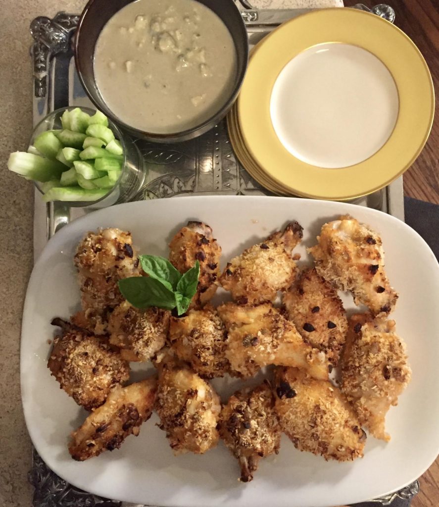 Panko baked crispy wings with Roquefort dressing and celery.