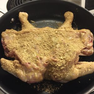 Quick nuts over fish mustard roasted chicken raw backside in a skillet.