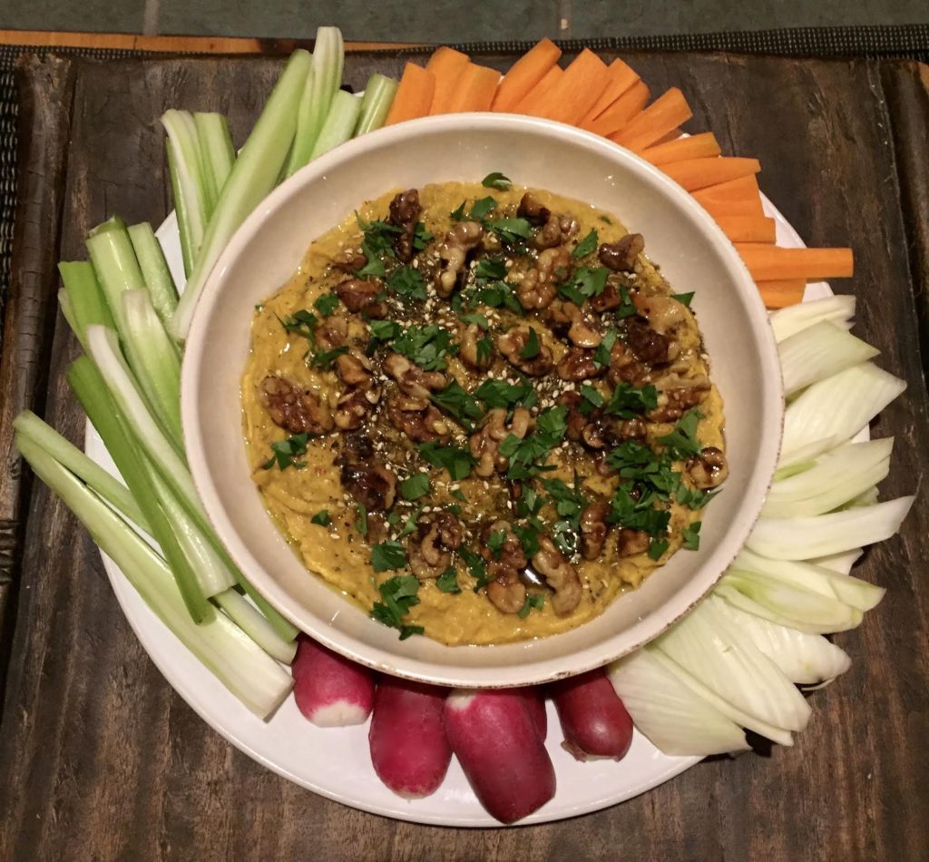 Roasted butternut squash dip with Home Cook's Pantry Za'atar on a platter with crudites.