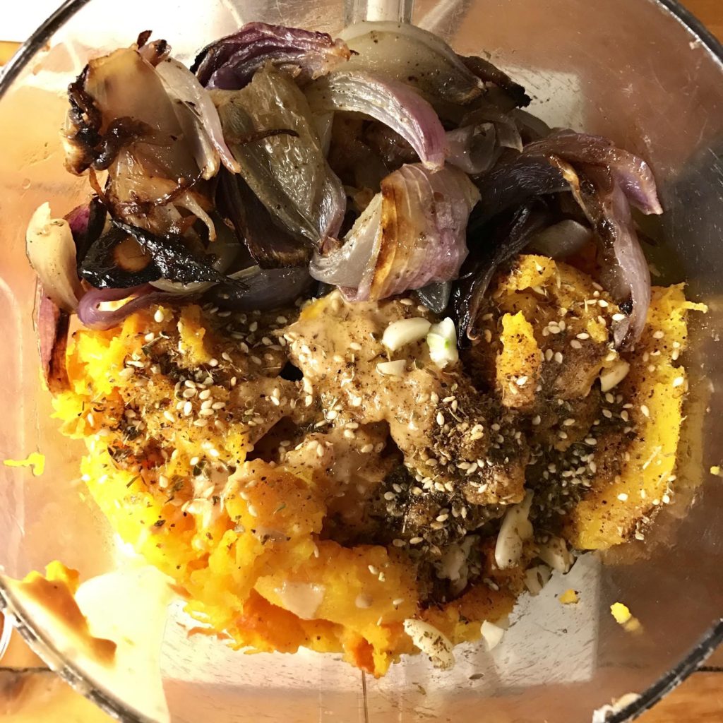 Roasted butternut squash with roasted onions and Home Cook's Pantry Za'atar in a Cuisinart.
