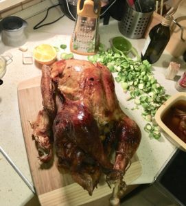 Roasted turkey on a cutting board.