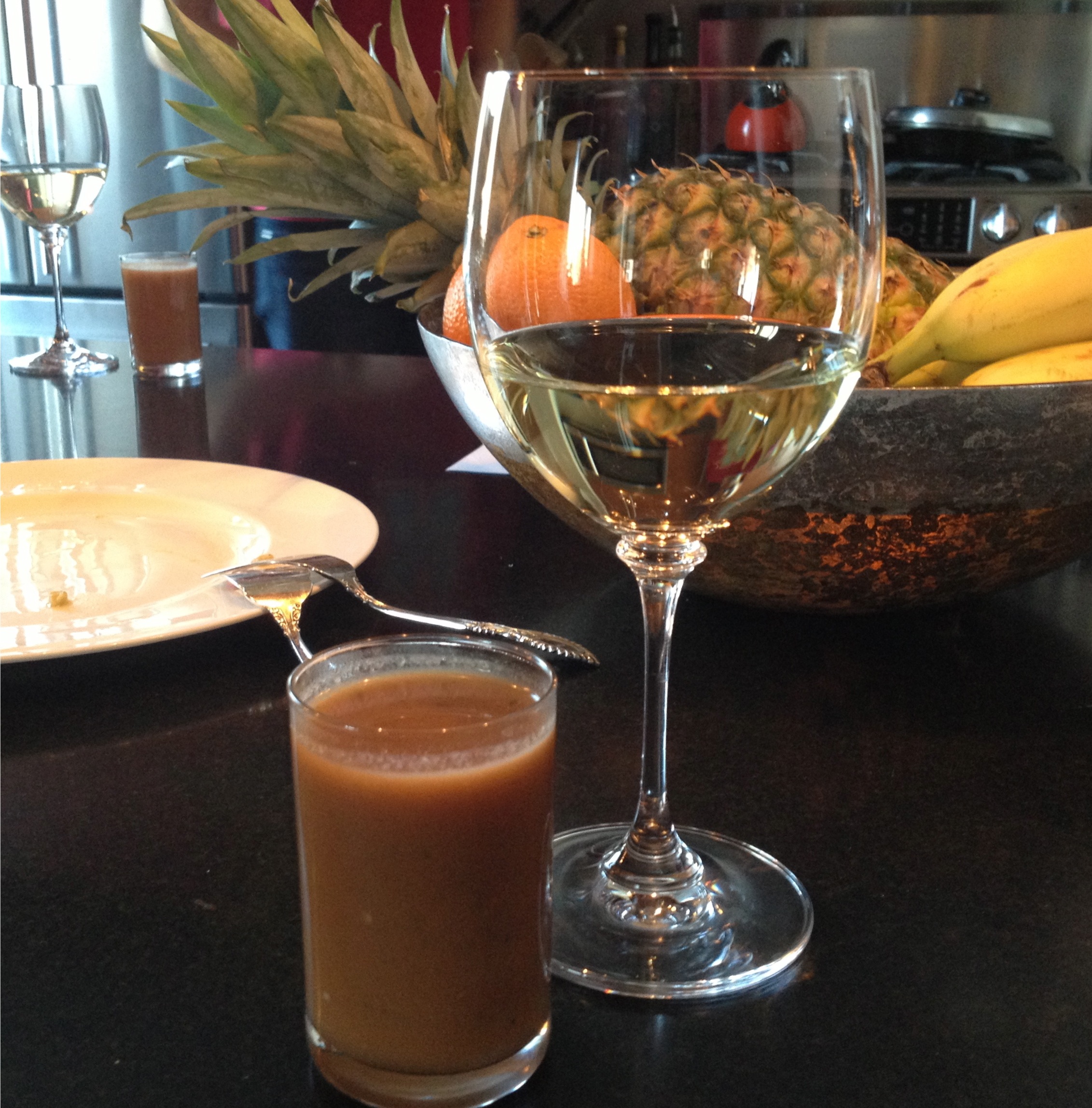 Gazpacho served in a glass, recipe from The French Laundry cookbook with a glass of Vouvray wine.